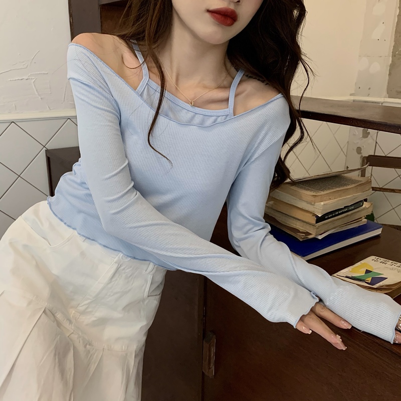 A two-piece set of long sleeve sunscreen top with thin pit strip and thin sling backing in summer