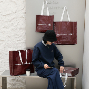 覆膜高档编织袋蛇皮袋服装店打包衣服手提袋加大背肩袋可定制logo