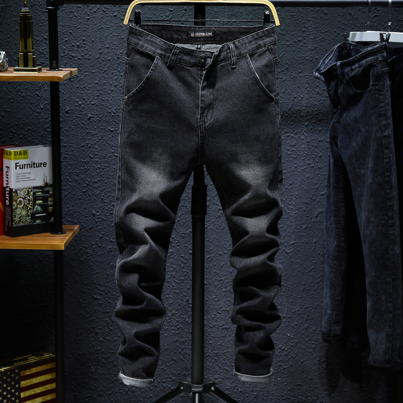 Winter black jeans men's slim little feet fashion brand youth elastic comfortable pants Korean version trend