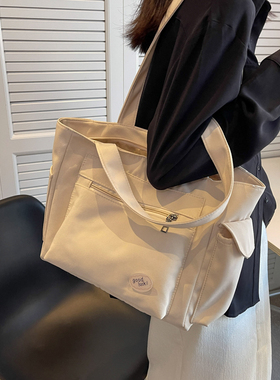 慵懒风大容量帆布包女2025新款时尚学生上课电脑包单肩手提托特包