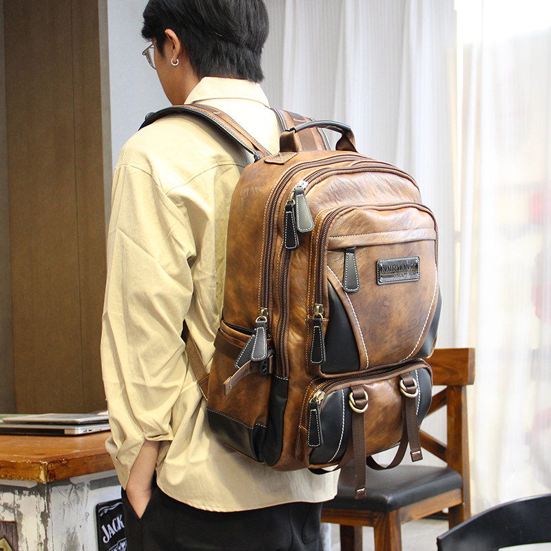 电脑包韩版个性大容量双肩包欧美学生书包男士出差旅行登山包潮