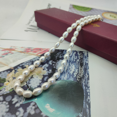 925银扣淡水珍珠米形项链瑕疵少