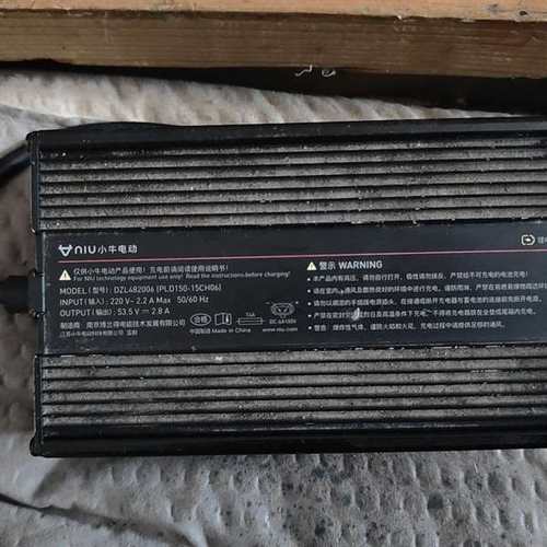 议价-小牛电动车原装充电器，型号DZL482006，