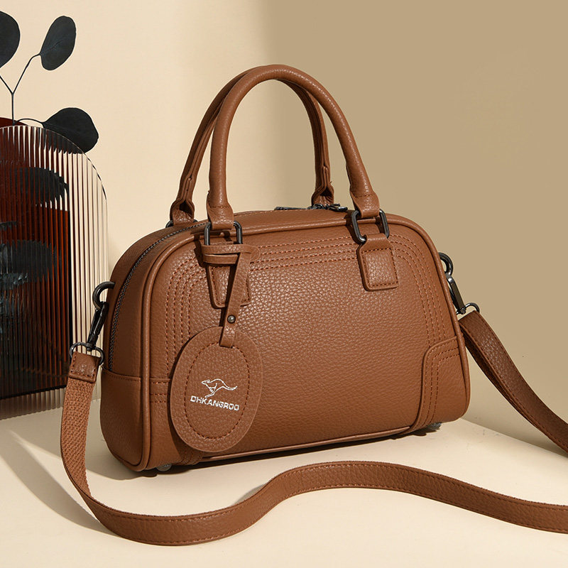 真皮质感女包大容量波士顿枕头包2025新款时尚斜挎包高级感手提包