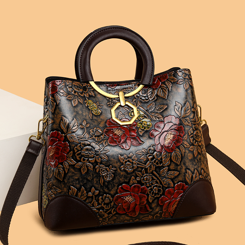 品牌轻奢大容量压花女包中年妈妈包2025新款高级感浮雕手提水桶包