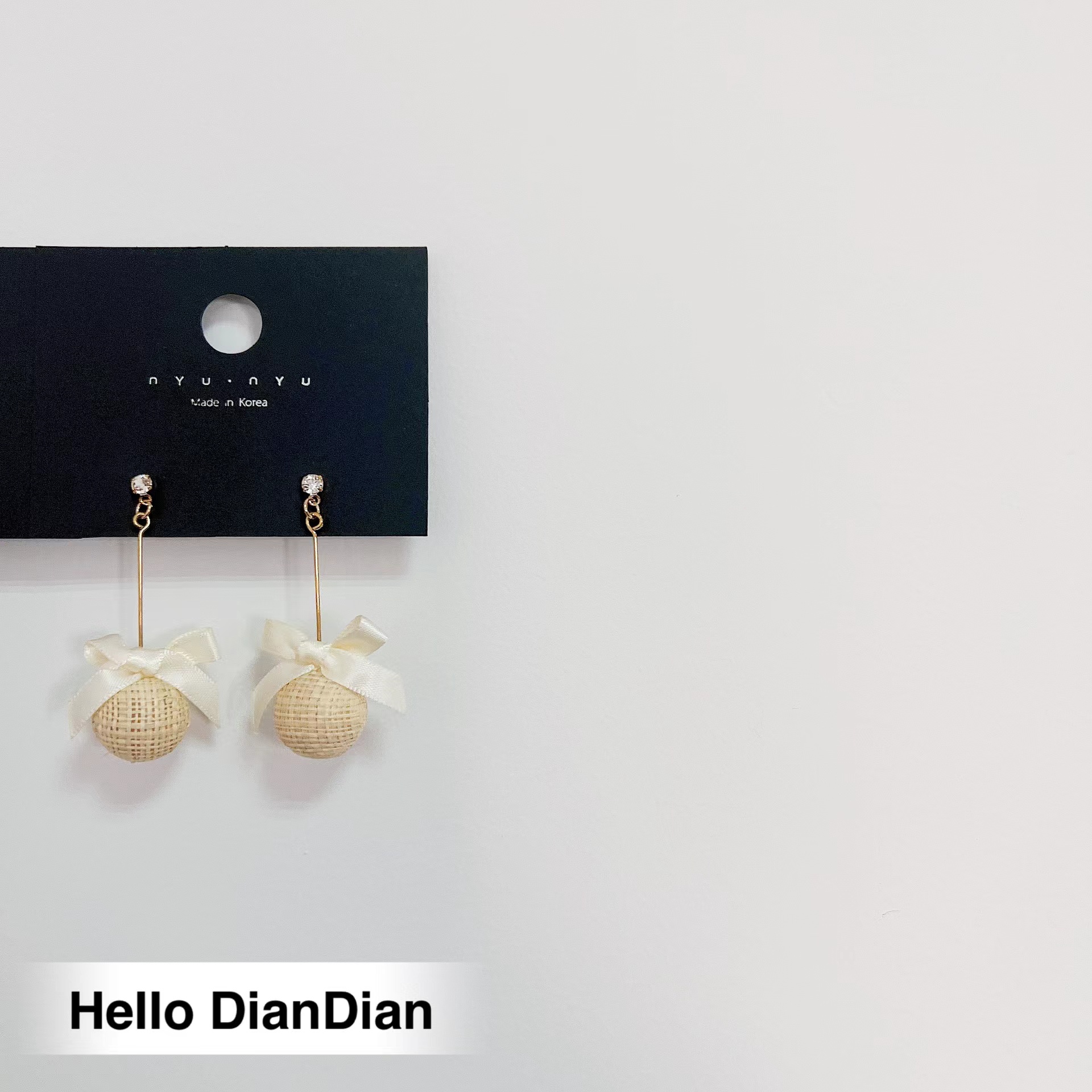 海边渡假蝴蝶结草编球ins耳环