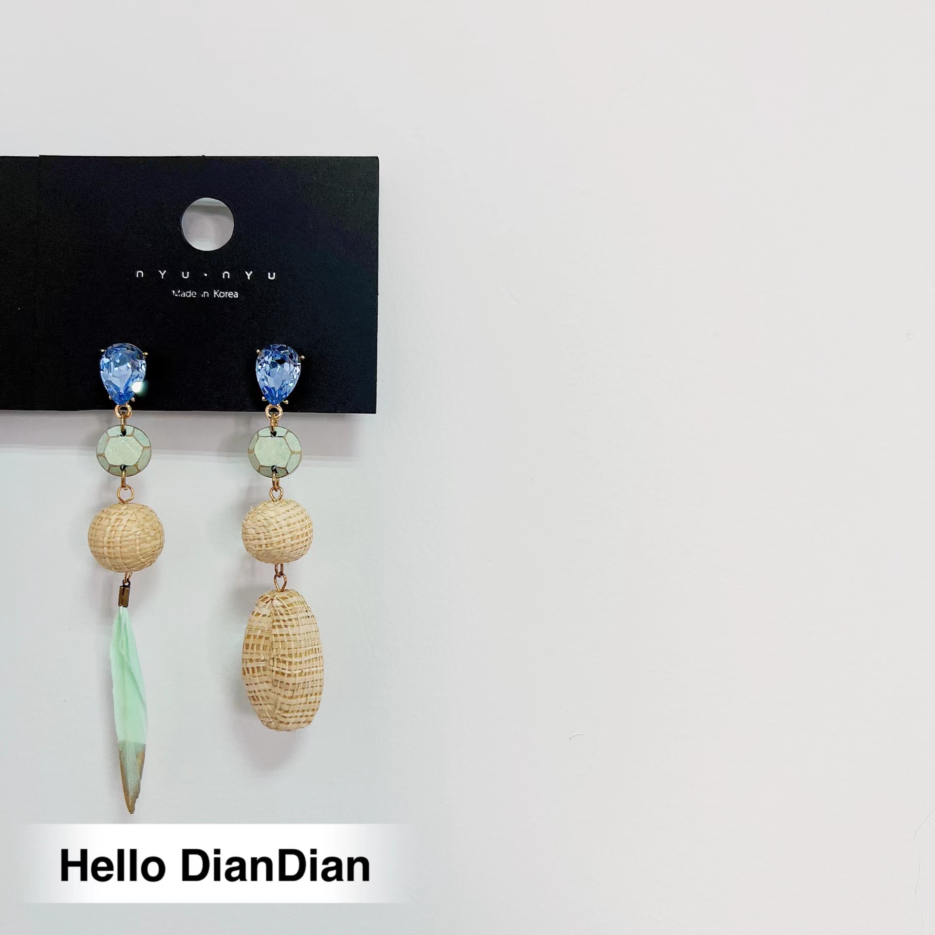 不对称海边渡假草编羽毛ins耳环