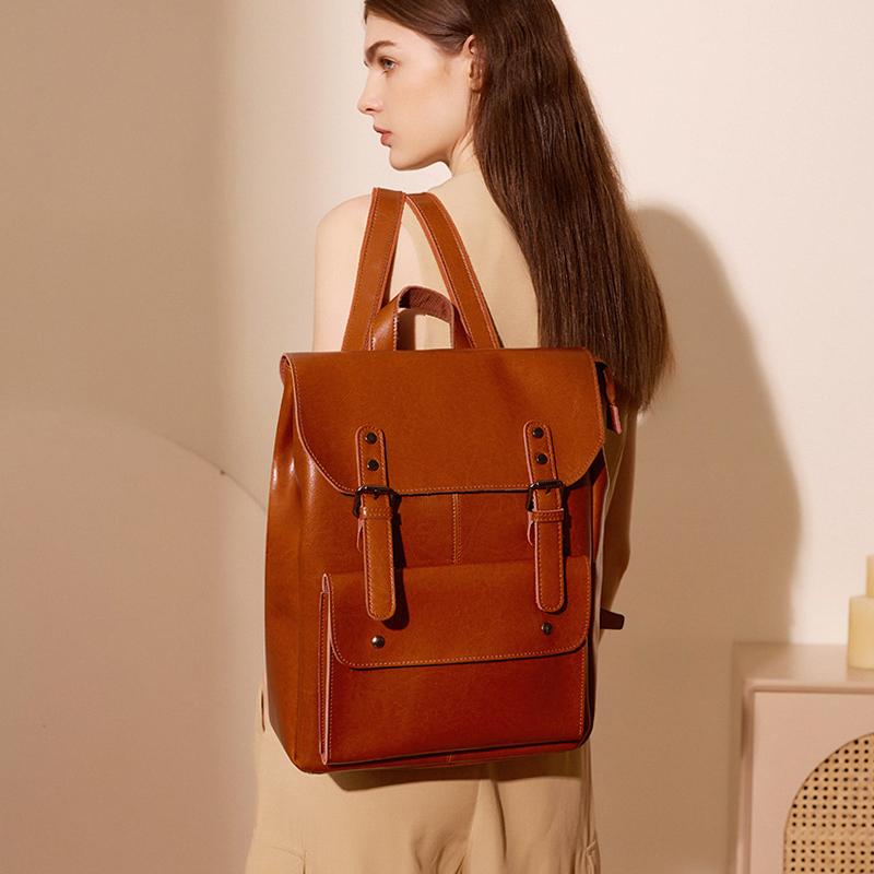 新款学院风双肩包牛皮大容量书包