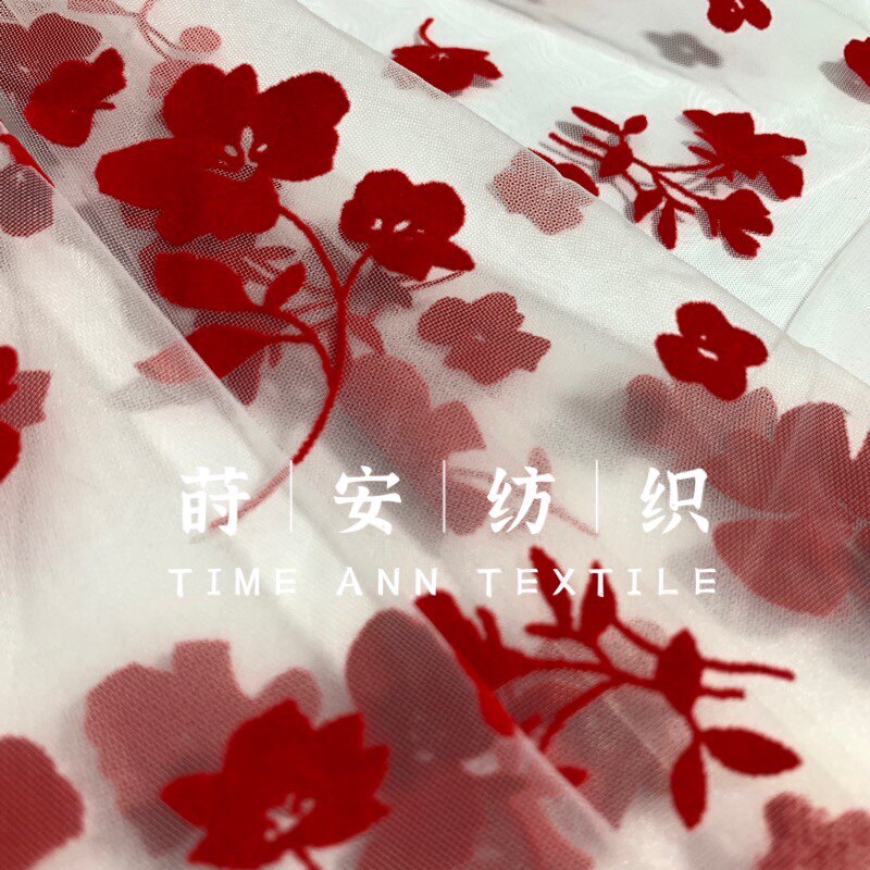 新品白纱大红色小花立体植绒布料网纱中硬袖子连衣裙高档服装面料