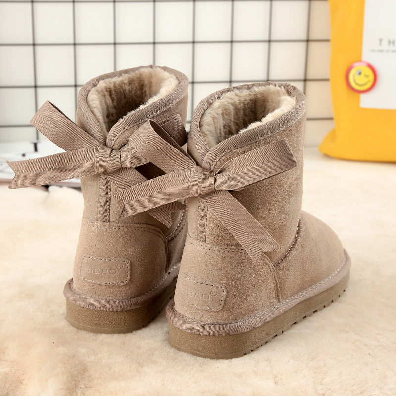 雪地靴女2020新款时尚韩版可爱蝴蝶结短筒真皮保暖雪地棉加绒棉鞋