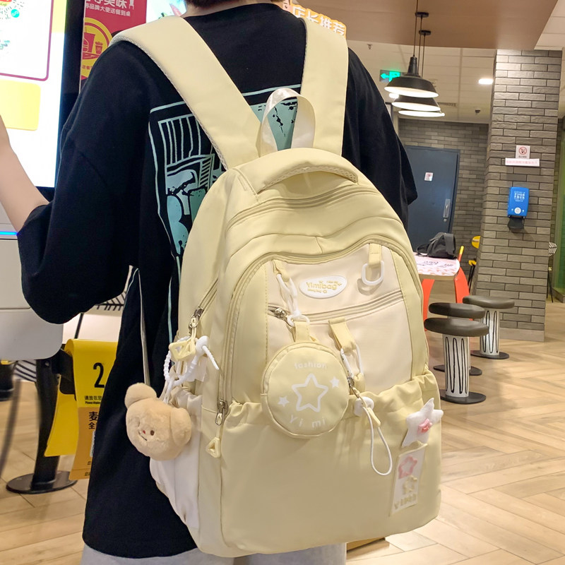 学院风奶黄色可爱书包初中生高中双肩背包
