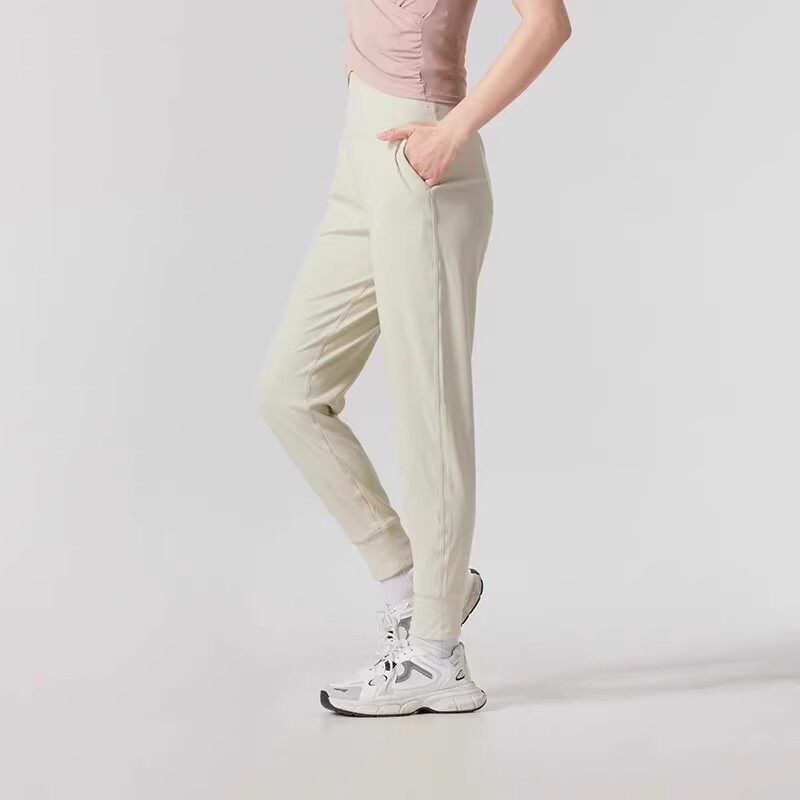 安德玛春秋女子时尚健身运动裤柔软弹性收腿长裤1375078-273-001