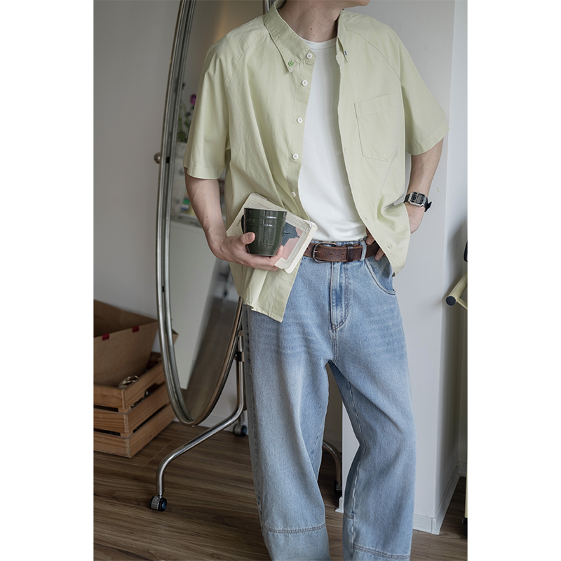 几立异形扣装饰插肩袖短袖衬衫