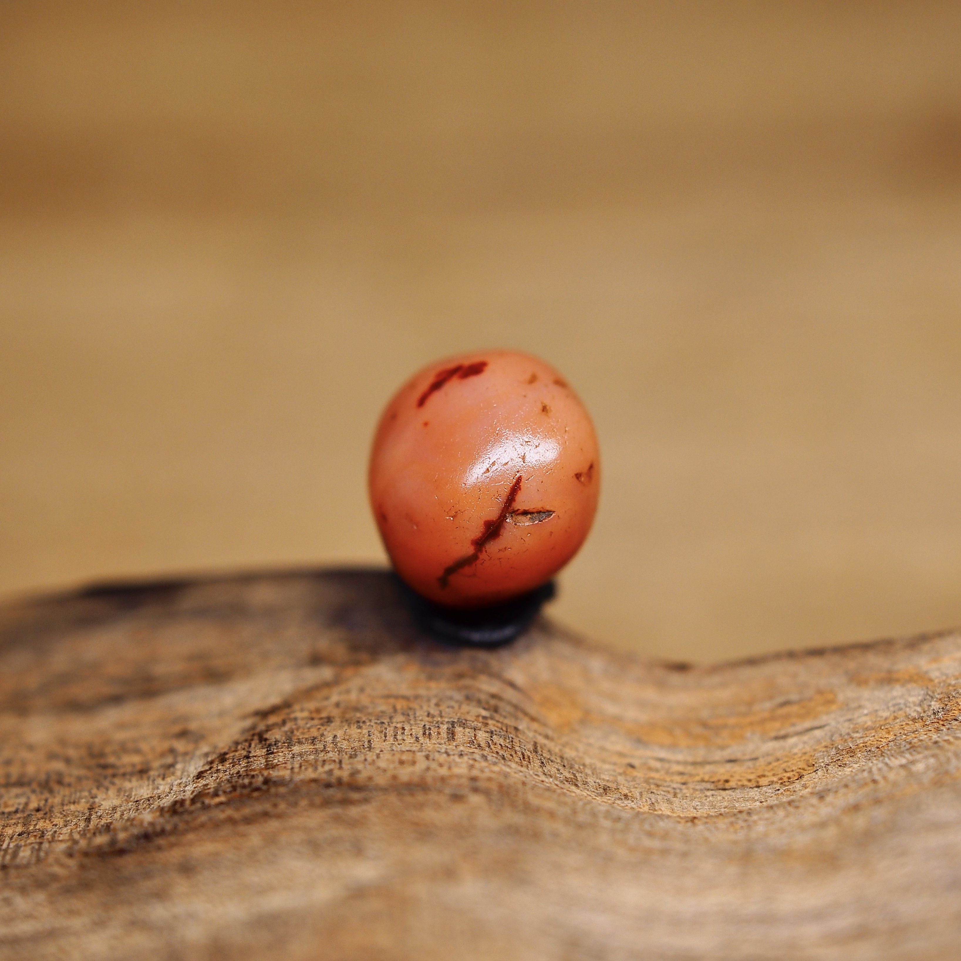 西亚千年pyu系橘红橙色老玉髓玛瑙珠8.5x7 老伤老磕碰 不圆 好价