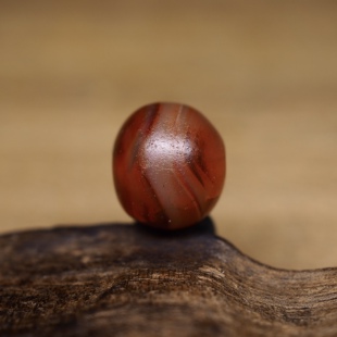 西亚千年阿契美尼德时期红色老玛瑙珠11.2x9.6 有裂纹伤 包老好价