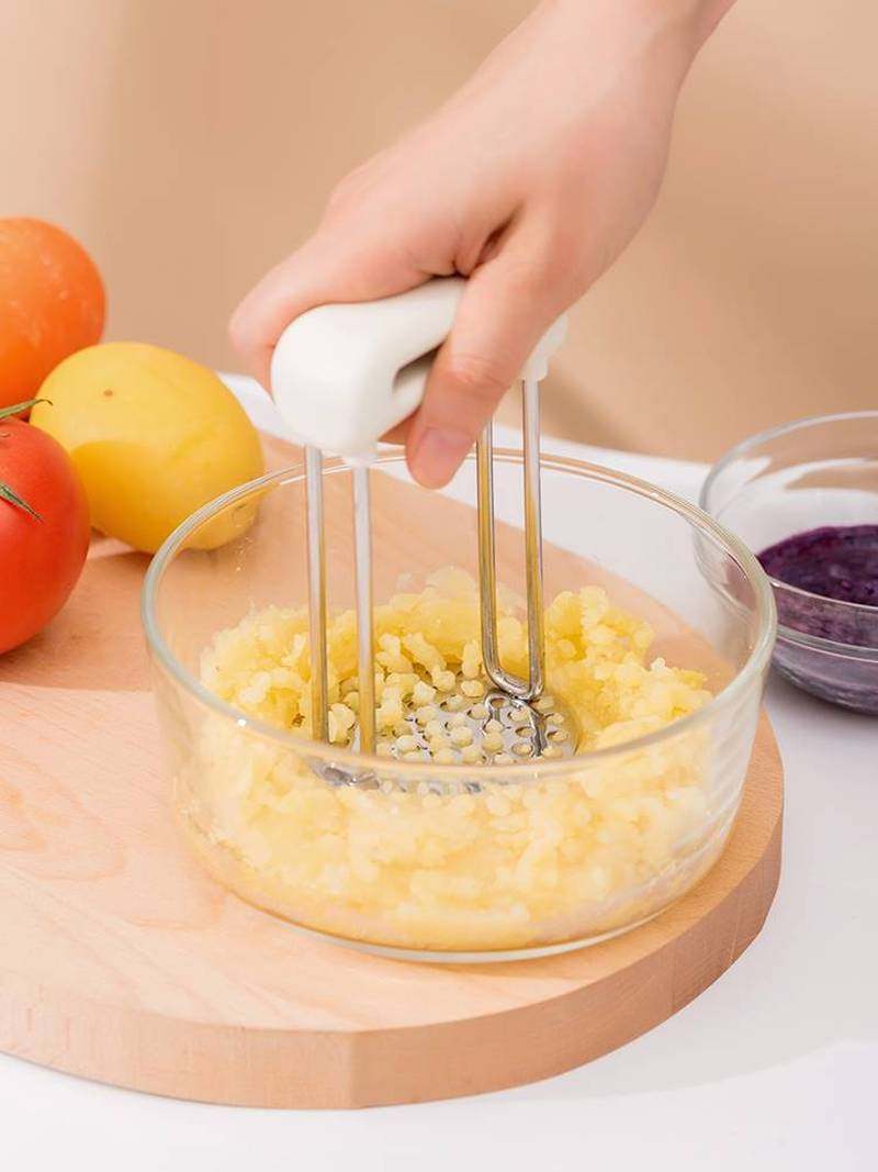 stainless steel pusher / potato masher with broad mashing