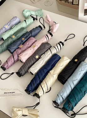 简约纯色超轻羽毛伞防晒防紫外线黑胶遮阳伞女晴雨两用便携太阳伞