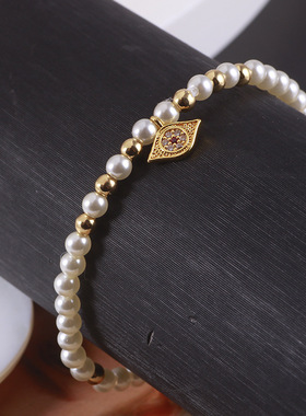 欧美饰品批发闪耀恶魔之眼金色珠珠珍珠拼色眼睛弹力手链代发混批