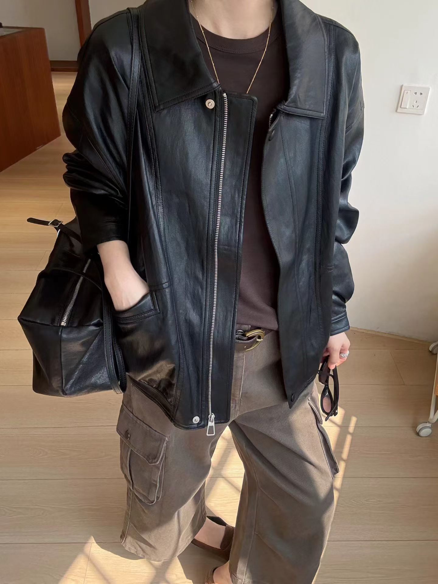 宽松休闲黑色皮衣外套欧洲站2026秋季新款极简风蛋白皮PU皮衣夹克