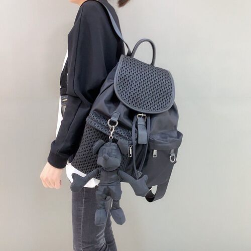 欧美牛仔布翻盖实用多口袋双肩包