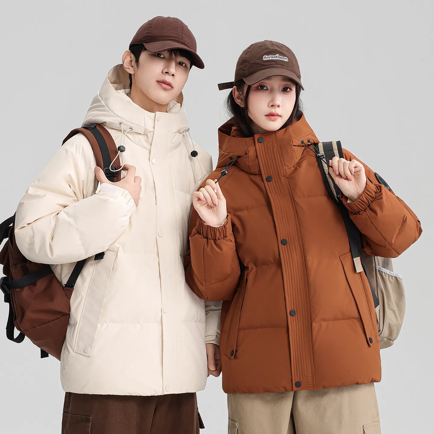 2025韩版时尚连帽情侣装外套冬季新款面包服潮流男女中长款羽绒服