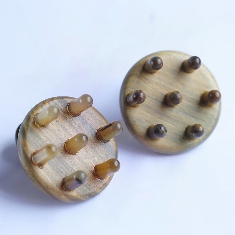 七星绿檀木按摩梳头疗刮痧头皮头部颈肩经络按摩器牛羊角圆齿梳子图片