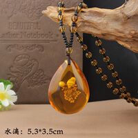 Imitation Brazilian plant fossil sweater chain, imitation amber and beeswax water drop peace pendant, ethnic scenic area necklace thumbnail 7