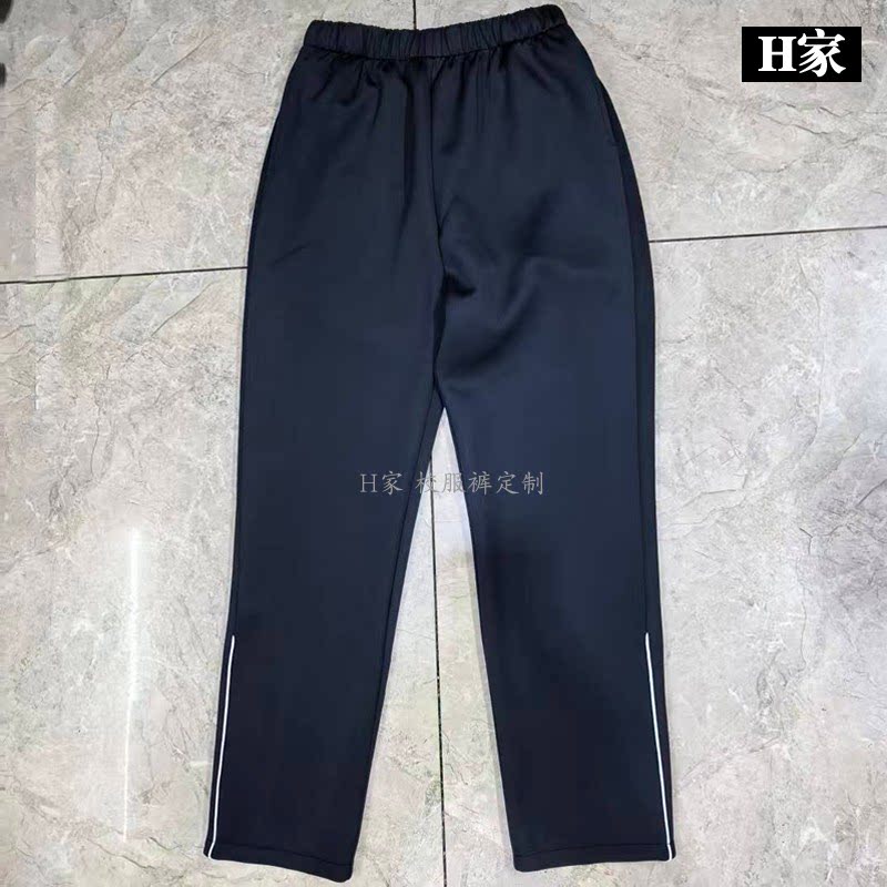 订做金台区陈仓路小学深蓝色校服运动裤小腿镶半截细白条散口加绒