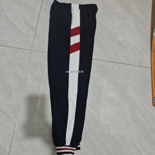 揭阳榕城区实验学校来图定制藏蓝校服裤子侧拼白条红斜杠束脚加绒