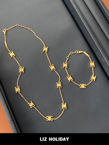金色立体凯旋门九花女士项链2023年新款手链一套网红爆款装饰品夏