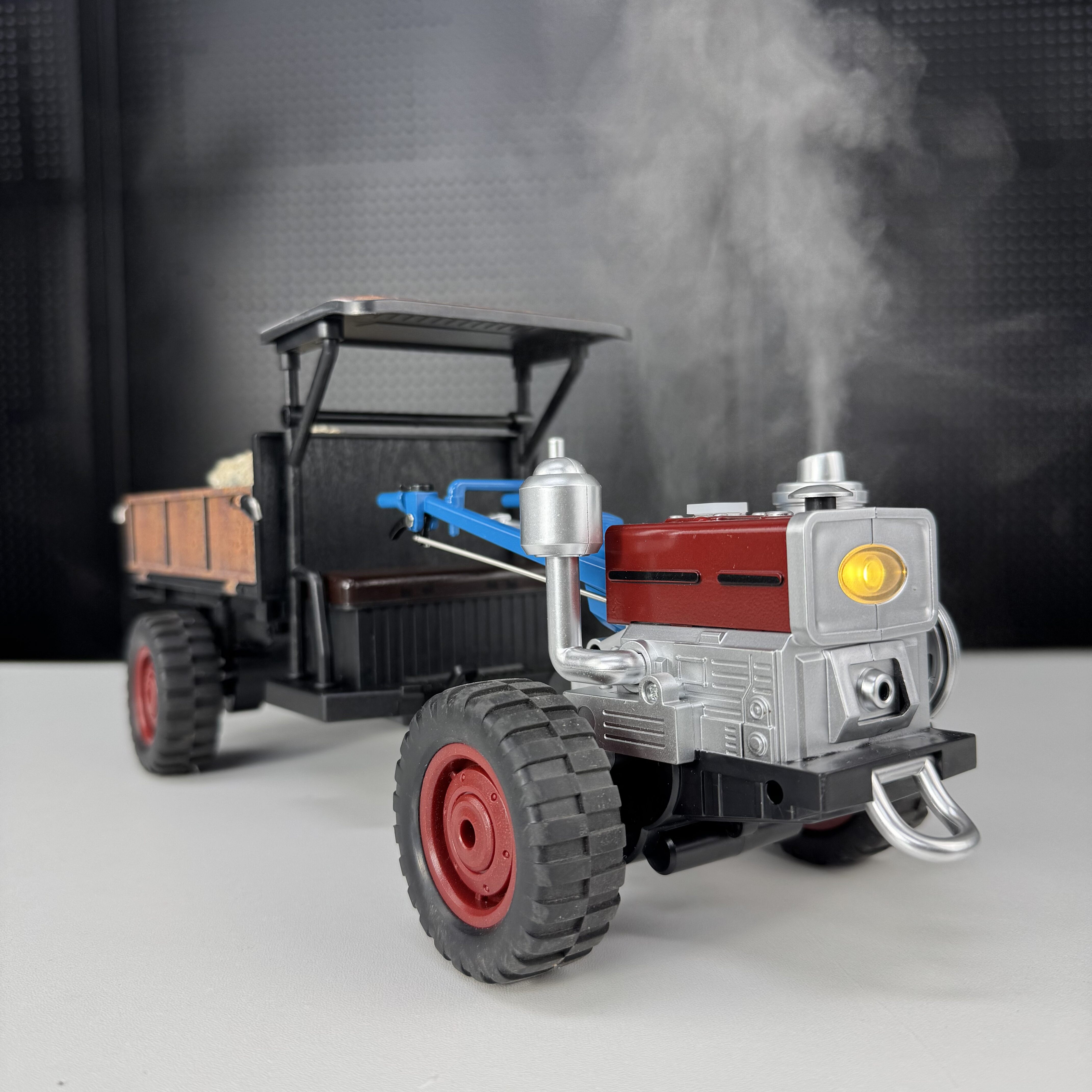 可冒烟有声组的遥控手扶拖拉机