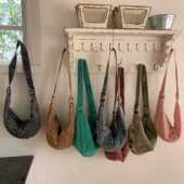 包包女斜跨日系洗水帆布包复古做旧牛角包饺子包单肩休闲中性包包