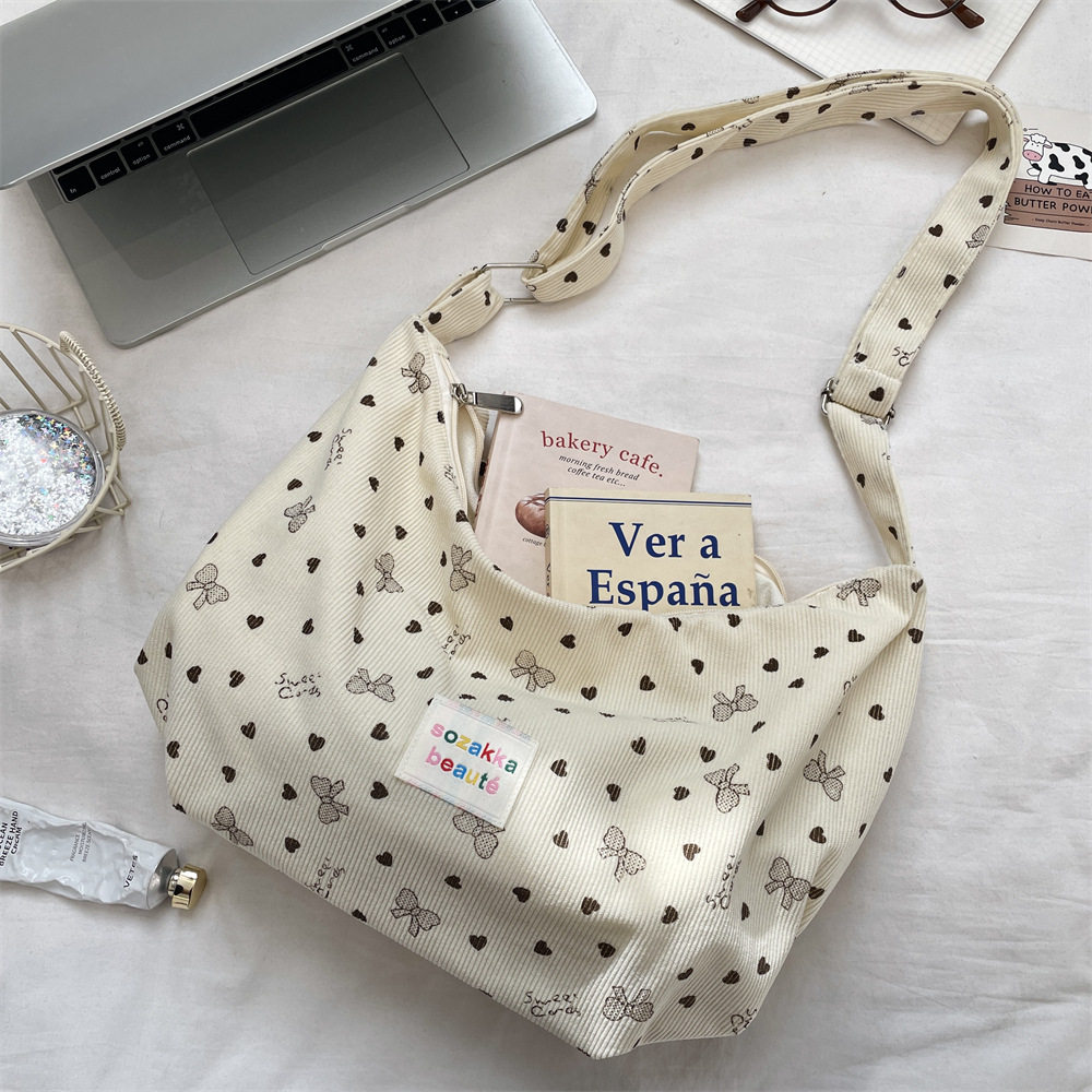 韩系早春包包ins单肩新款灯芯绒小众蝴蝶结韩版斜挎帆布包购物袋