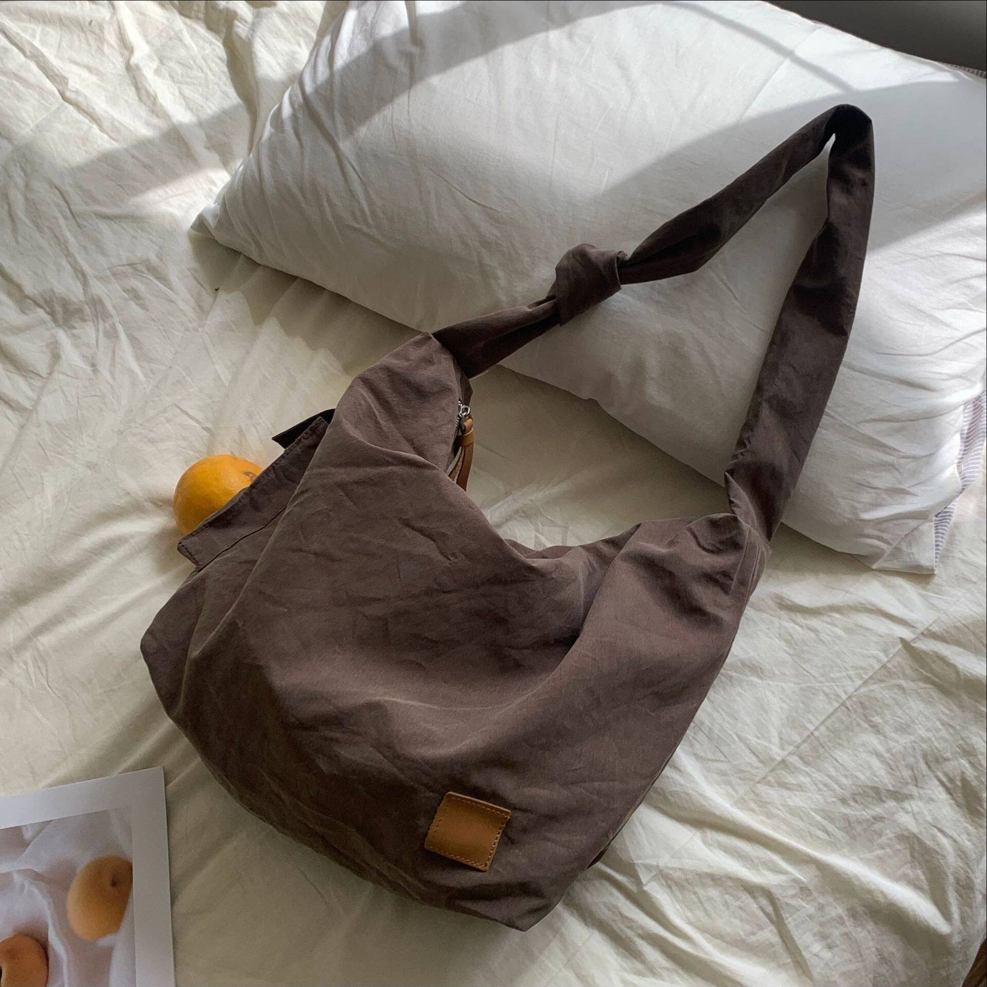 韩版斜挎包女款日系尼龙单肩包复古休闲通勤饺子轻便休闲小众包女