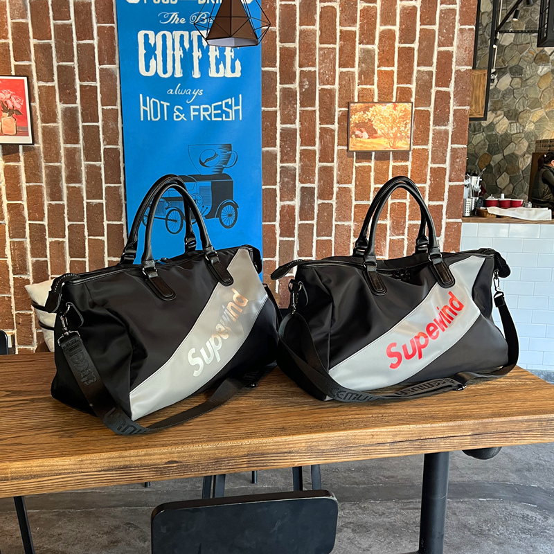 防水布休闲行李袋男女通用旅行包