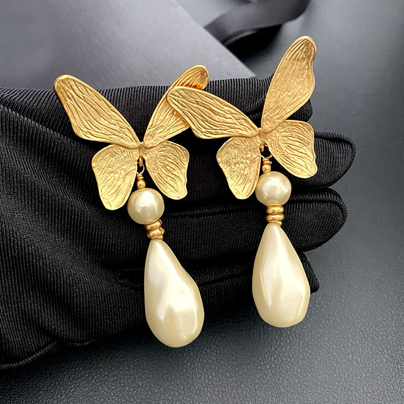 【耳夹】欧美大气蝴蝶珍珠吊坠浮夸走秀耳夹气质女王无洞耳环配饰