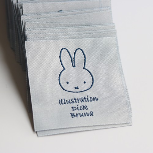 白底蓝色卡通米菲tu织唛布标现货