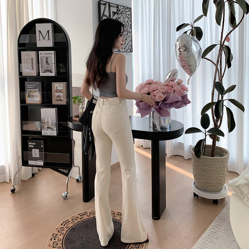 西草儿修身显瘦米白色微喇牛仔裤