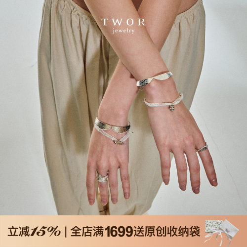 925银淡水珍珠边鸢尾花领结手镯