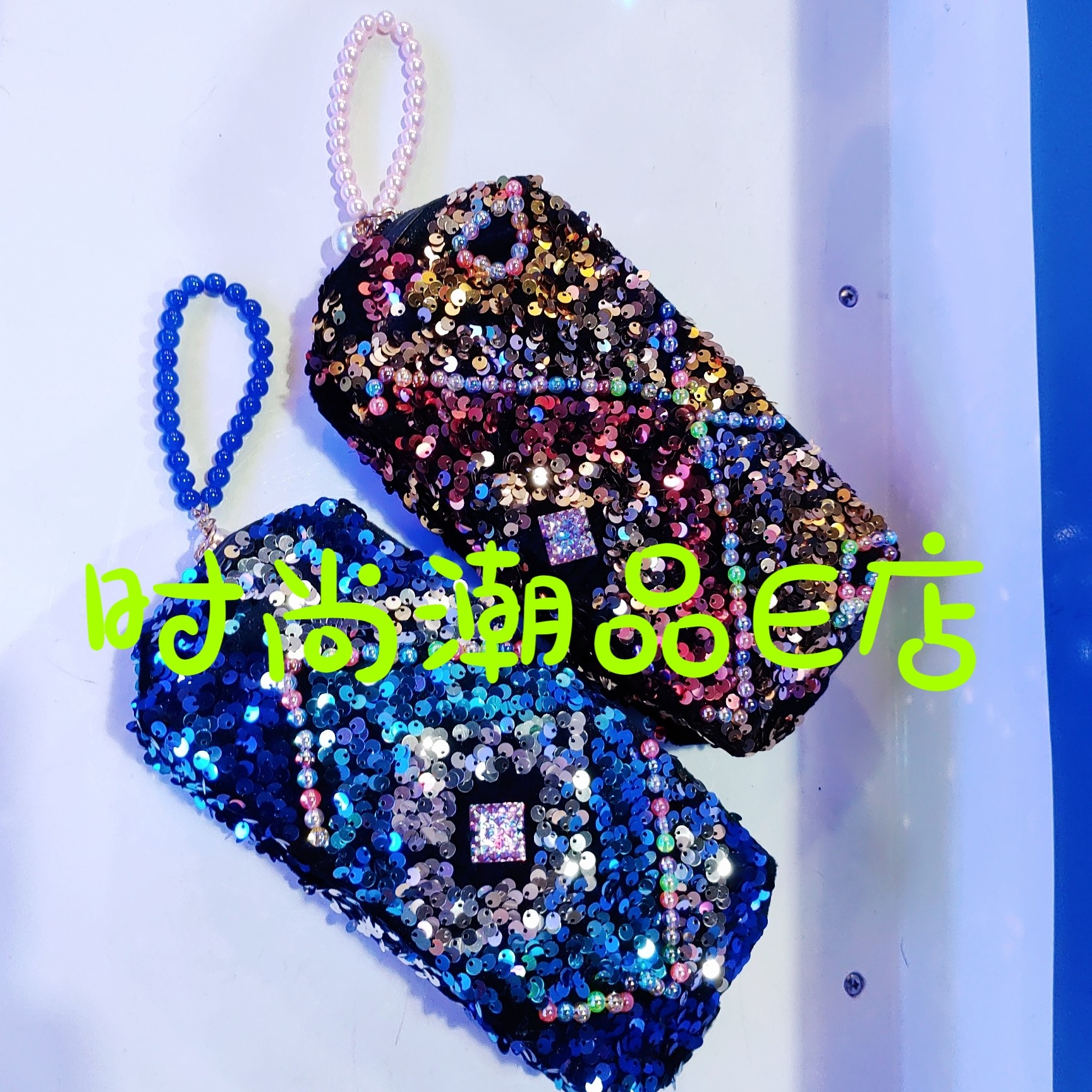 E00214  设计款重口全亮片时尚手包化妆包