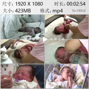 产科手术室护士接生为新出生的婴儿洗澡称重宝宝啼哭实拍视频素材