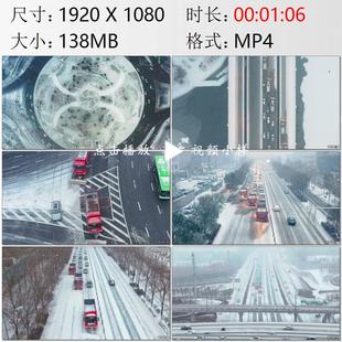 航拍吉林长春冬季大雪纷飞清雪车清理积雪晚高峰车流实拍视频素材