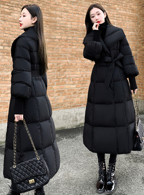 黑色系带翻领长过膝外套2025年新款女装冬季修身收腰长款羽绒服女