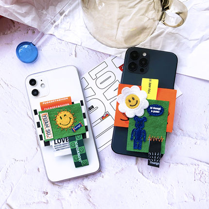TRSTUDIO潮牌笑脸太阳花暴力小熊手机壳支架适用于iphone1312安卓