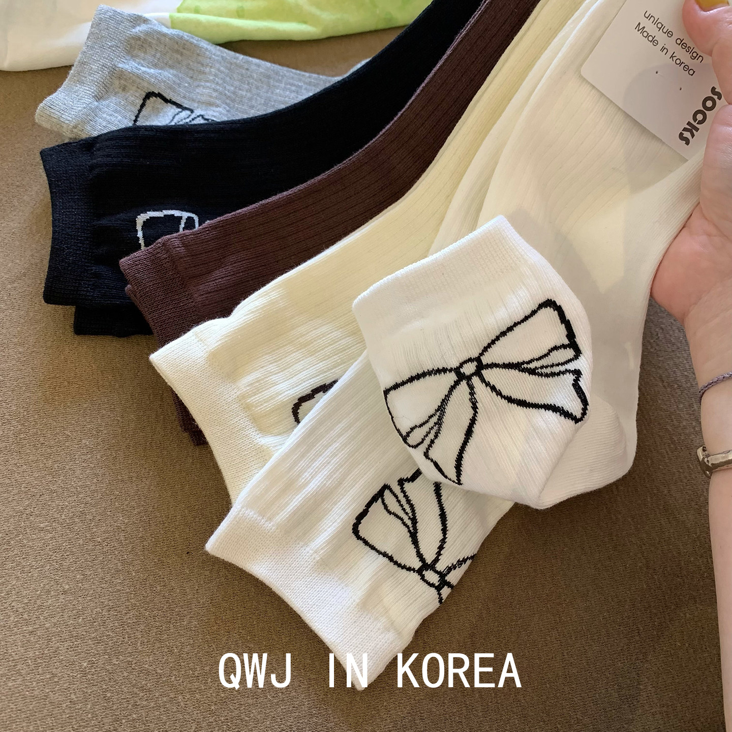 好棉韩国进口女袜简笔蝴蝶结后跟纯色棉袜甜美中筒袜白色运动袜子