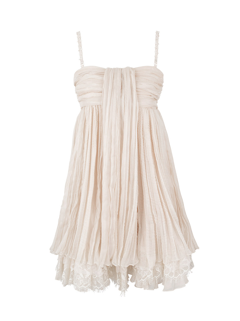 Cream-colored pleated dress with lace trim and thin straps