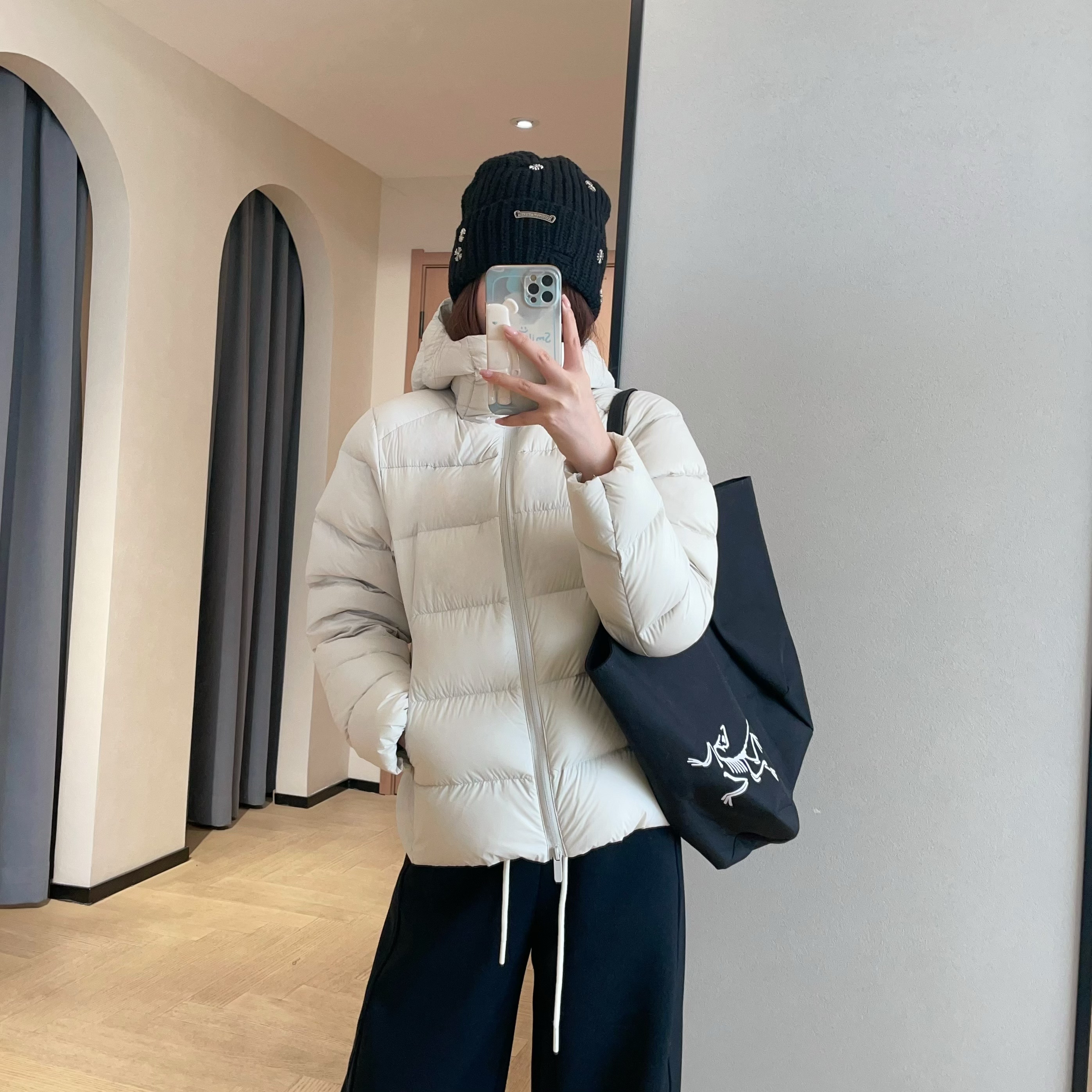 95白鹅绒三防保暖宽条排骨羽绒服图片