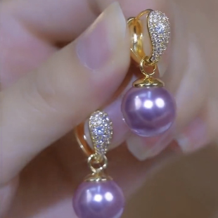 高级感耳环2024年新款潮大牌耳饰葡萄紫珍珠银针耳钉气质圆脸显瘦