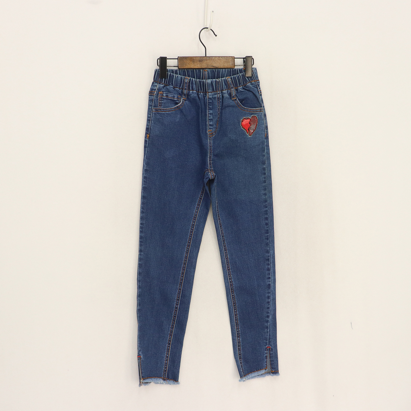 亮片爱心弹力修身毛边开叉小脚裤