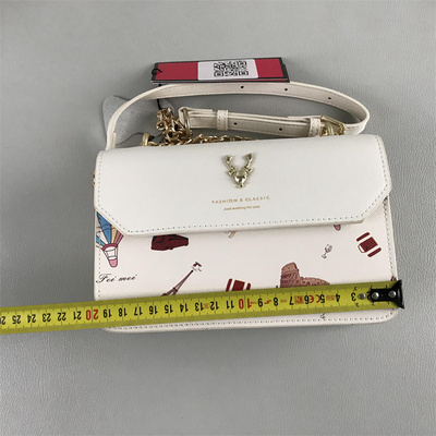 KissKitty小森系牛剖层革单肩包